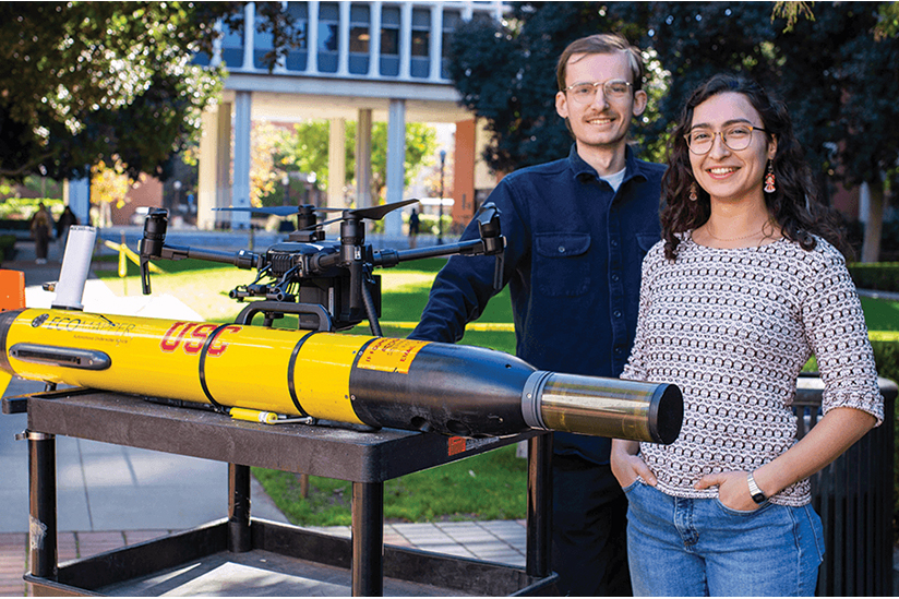 CHRIS DENNISTON AND ISABEL RAYAS ARE DEVELOPING WAYS FOR AUTONOMOUS ROBOTS TO LOCATE TOXIC ALGAE IN LAKES. PHOTO/EMILIA DODA.