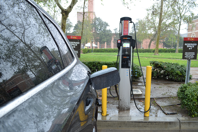 An electric vehicle charging at USC