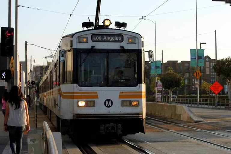 Metro train pulling into a station.