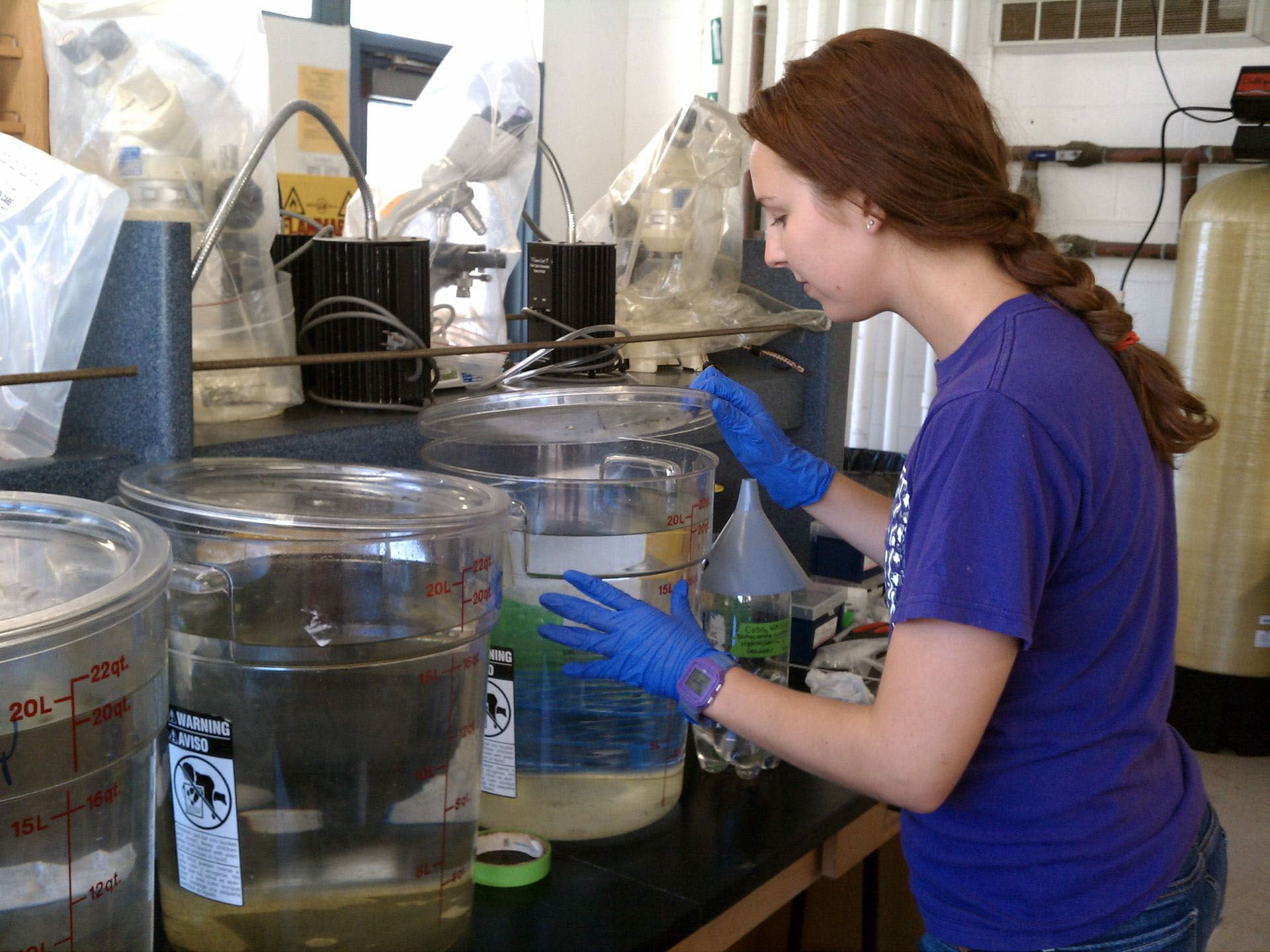 A USC student conducting experiments in a science lab.