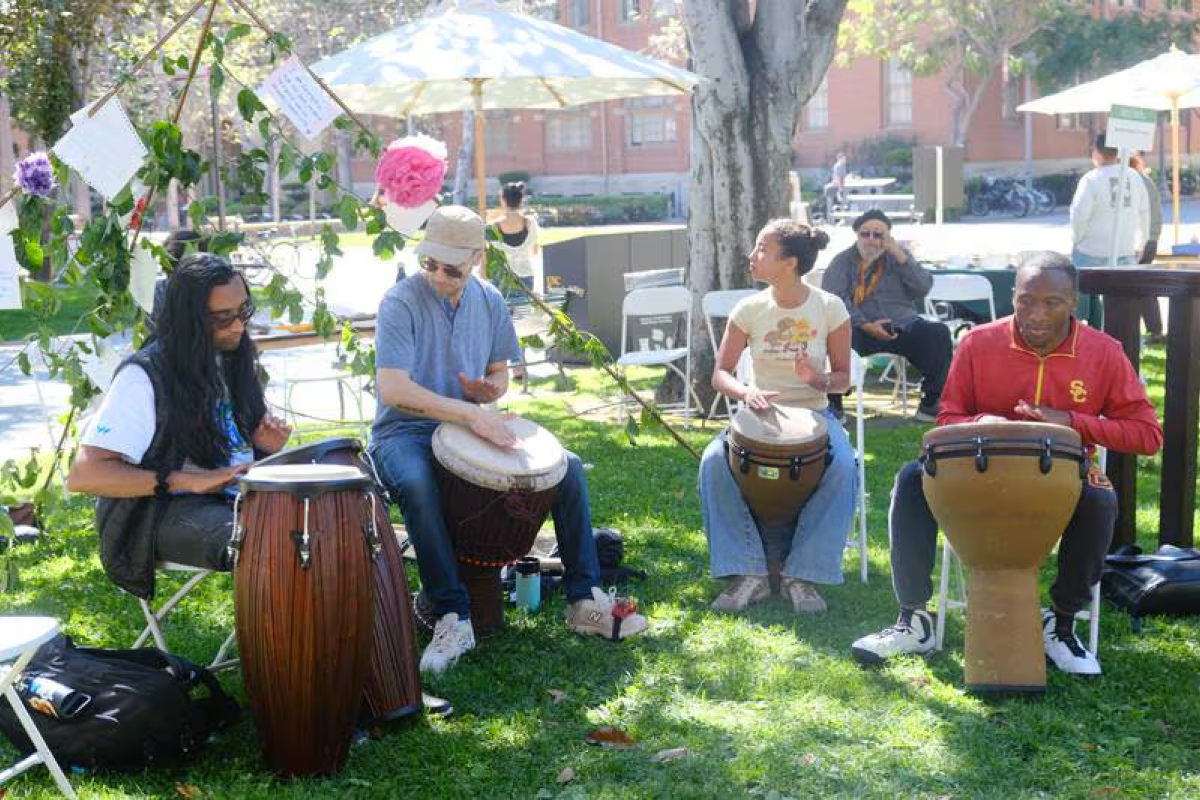 People bang on drums during the Arts & Climate Collective annual festival. (Photo by Vishu Reddy)
