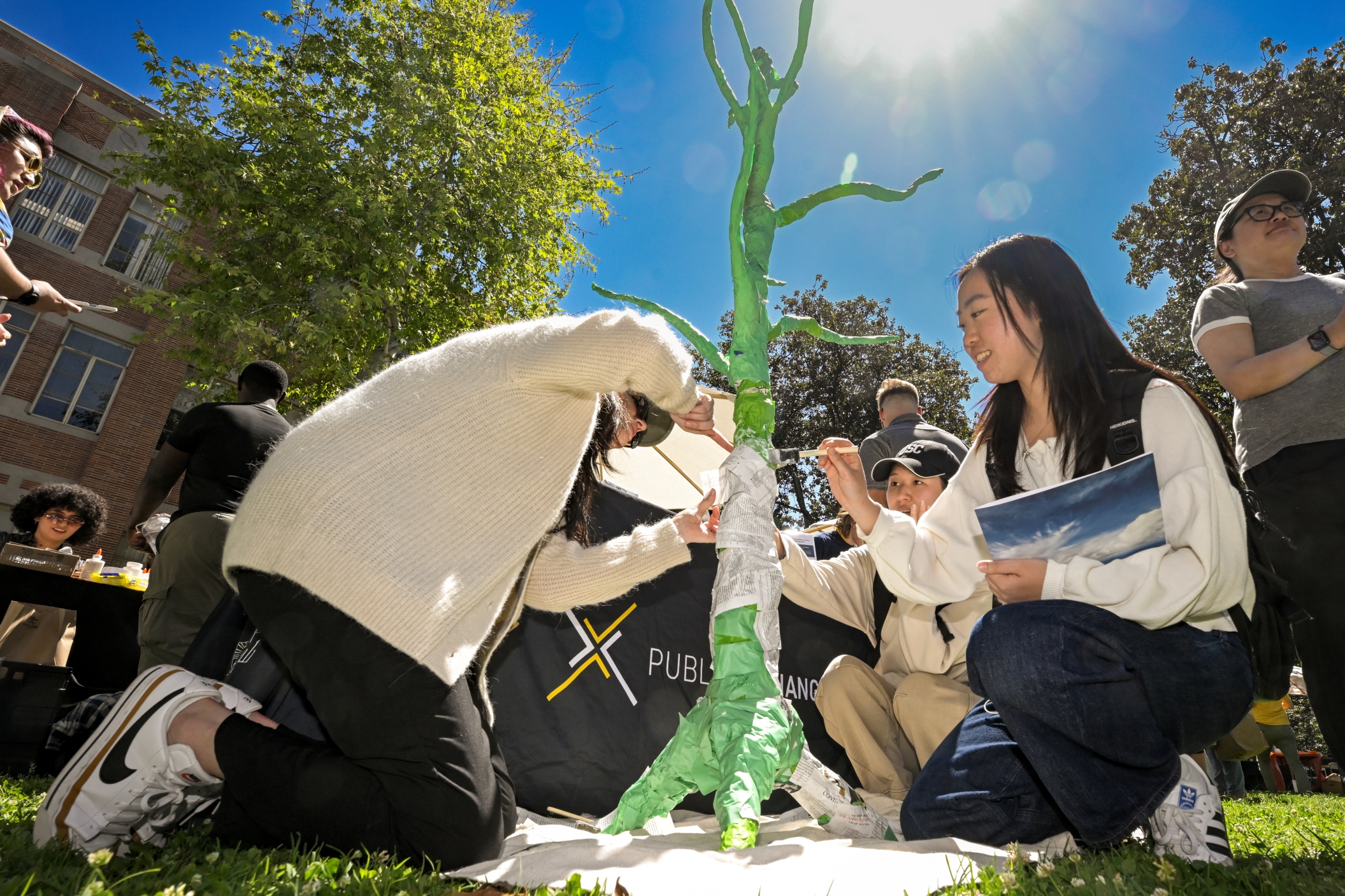 Students collaborate on an art project during the USC Arts & Climate Collective 2024 Festival.