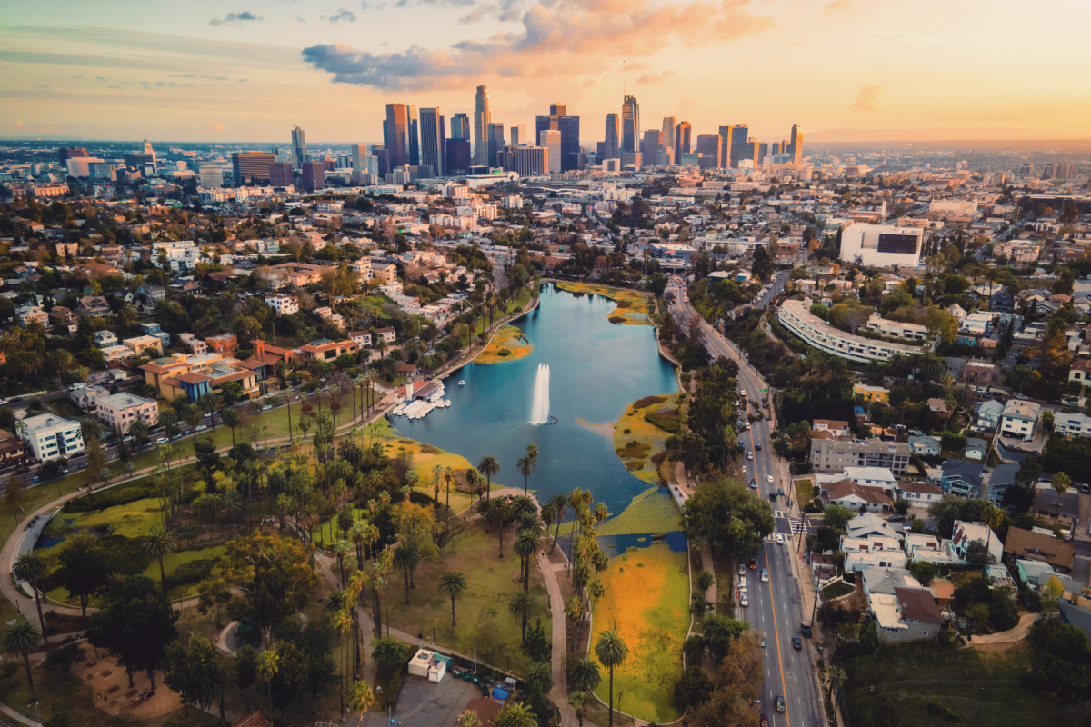 A reimagined Los Angeles skyline with greenery and water features.