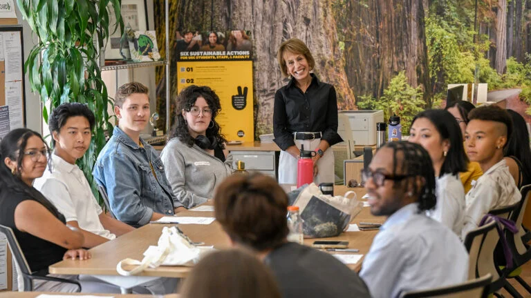 USC President Carol Folt greets Sustainability Hub interns and staff. (USC Photo/Gus Ruelas)