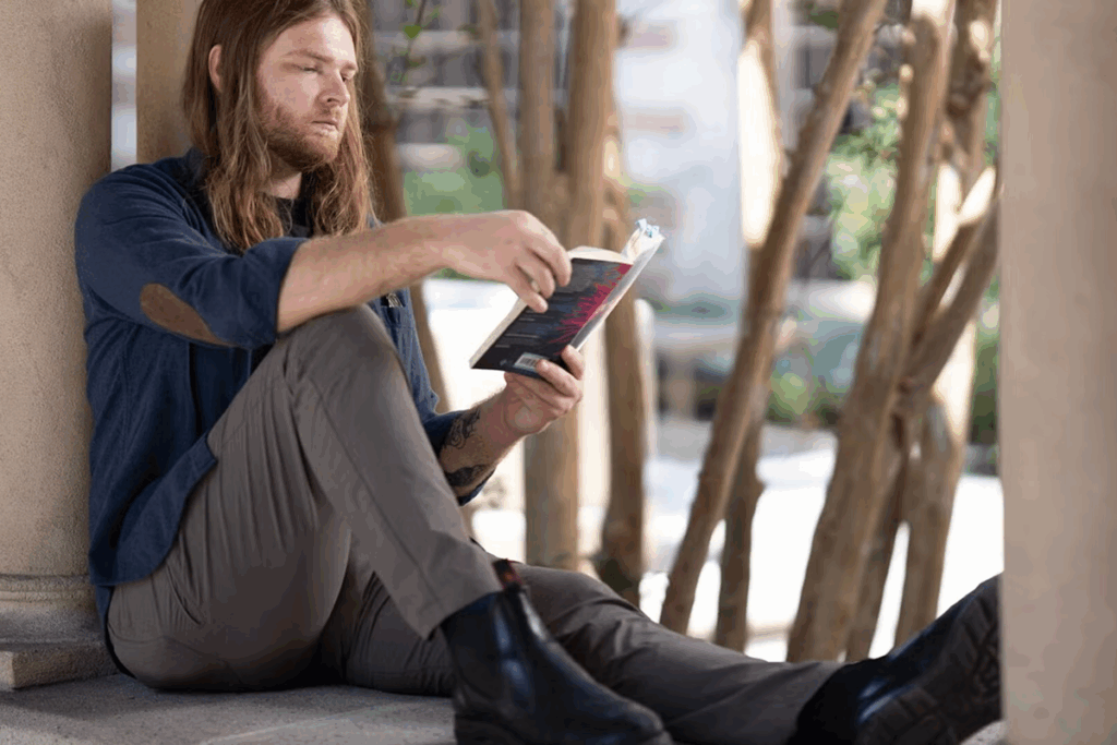 2025 Wrigley Institute Graduate Fellow Josh Beckelhimer, a PhD candidate in the USC Dornsife Department of English, studies the fictional works of writers who narrate possibilities of climate change futures (Nick Neumann/USC Wrigley Institute).