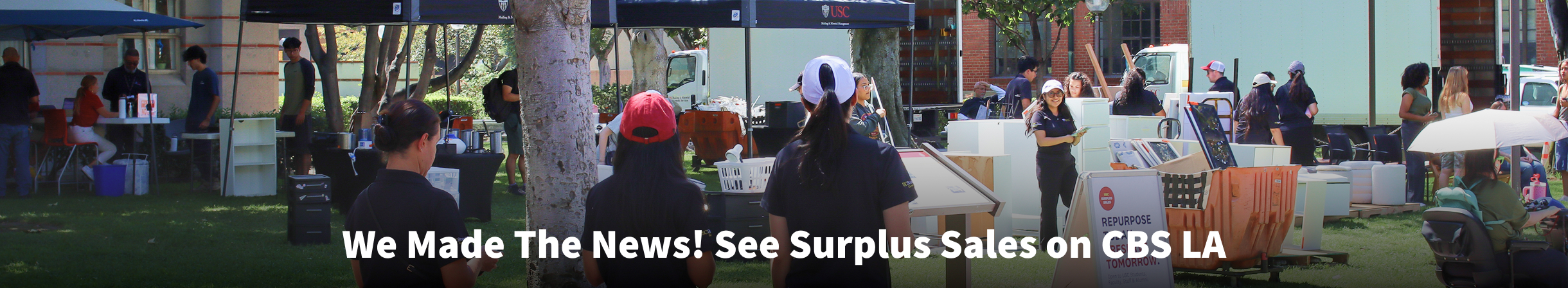 A USC Surplus Sales pop-up event on Trousdale Parkway, with the text "We Made The News! See Surplus Sales on CBS LA"